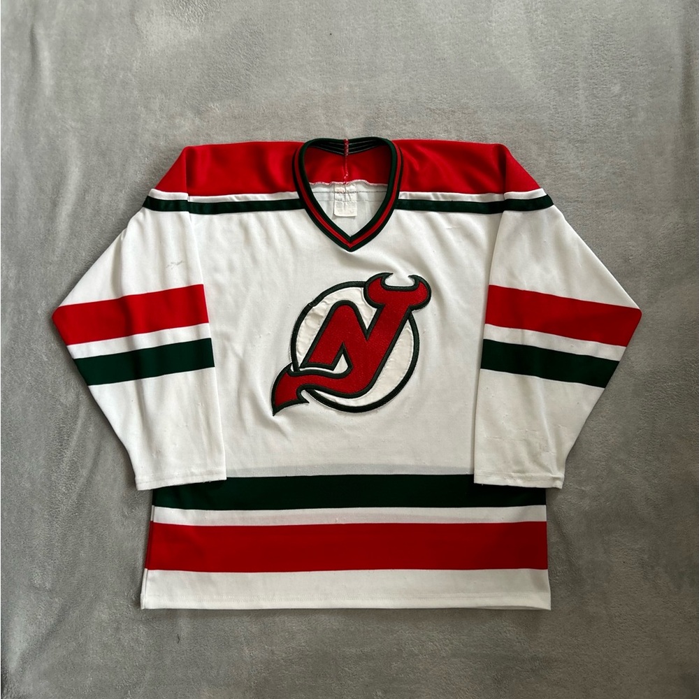 CCM White, Red & Green Hockey Jersey with Center Logo
